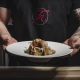 private chef serving food at home