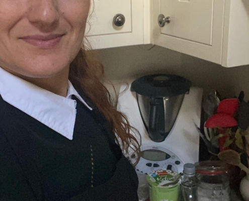 Dineindulge Chef On Mental Health Awareness Day Dinenidulge private chef wearing a mental health awareness badge